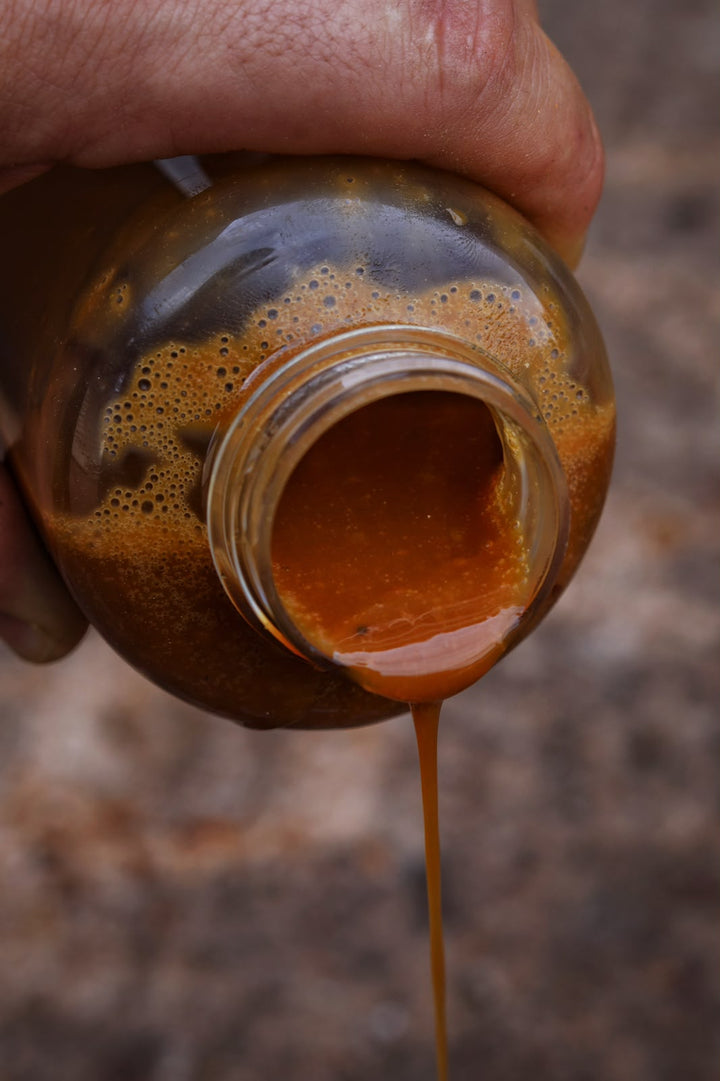 Butter Crunch liquid food carp bait additive by Octopus Baits